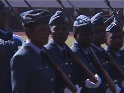 Military parade marks Defence Forces Day; Mugabe soundbite News Clip