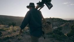 Middle-Aged Caucasian Male Outdoor Photographer Walking Stock Footage