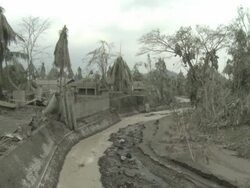 Village devastated by heavy Ashfall from eruption of Merapi volcano; Indonesia. 7 November 2010 / AUDIO Stock Footage