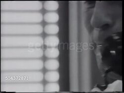 1966: VICTOR SEIXAS: Victor at desk talking on telephone calling out to buy 500 WMK at market. VS Victor walking through office, talking w/ man in another office, Vic putting papers in desk, picking up coat. [VO Victor on goals & trying other things] Instructional Video