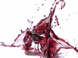 CU SLO MO Glass of red wine exploding and splashing / Vieux Pont, Normandy, France  Stock Footage