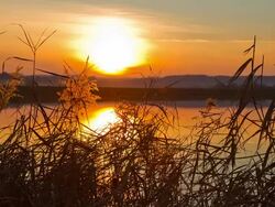 HD TIME-LAPSE: Lake At Sunset Stock Footage
