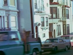 POV driving along hilly city street. Stock Footage