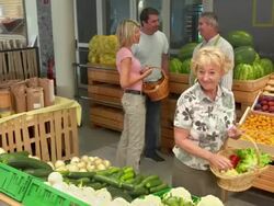 HD DOLLY: People Shopping In Greengrocer'S Shop Stock Footage