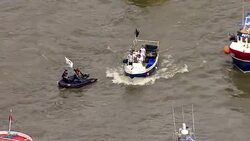 Aerials of Fishing for Leave and Vote Remain EU Referendum Campaign Boats on the River Thames News Clip