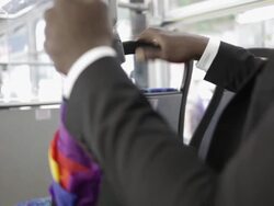 CU young man dressed up in black suit and sitting in bus / Minneapolis, Minnesota, United States Stock Footage