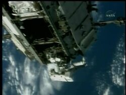 Instead of enjoying a relaxing day at the international space station, the space shuttle Discovery's seven astronauts prepared Sunday for an unplanned, fourth spacewalk to get a stubborn, half-retracted solar array to fold up News Clip