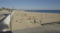 Barcelona Beach Playing Volley ball Stock Footage