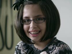 Slow motion of young girl in doctors office smiling big. Stock Footage