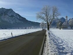 WS View of church St. Coloman near Schwangau in winter / Schwangau, Bavaria, Germany Stock Footage