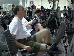 People working out at YMCA gym Stock Footage