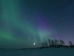 T/L of rolling clouds over romote lodge Stock Footage