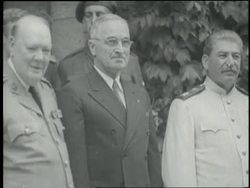 British Prime Minister Winston Churchill, President Harry S. Truman, and Joseph Stalin shake hands while posing for pictures at the Potsdam Conference. News Clip