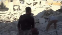 Rescuers clearing rubble in the aftermath of an airstrike in Aleppo, Syria News Clip