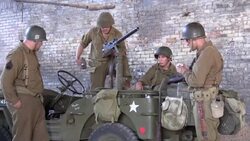 American World War 2 GIs wait in derelict building Stock Footage