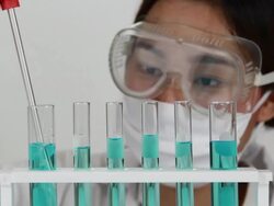 Scientist researching at laboratory Stock Footage