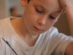 Boy Studying his Homework Stock Footage