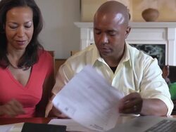 Husband and Wife Discussing Important Documents Stock Footage