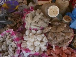 MS Cereals at market / Labe (market), Guinea Stock Footage
