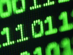 Binary code on computer monitor Stock Footage
