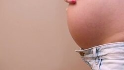 close up of pregnant woman's belly Stock Footage