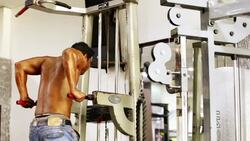 Triceps Exercise in the Gym Stock Footage