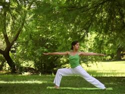 Young woman doing yoga exercise Stock Footage