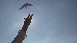 Slow Motion of Flying Paper Plane Stock Footage