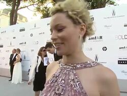 INTERVIEW: Elizabeth Banks at the amfAR Cinema Against AIDS Gala at Antibes . (Footage by WireImage Video/GettyImages) Stock Footage