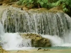 MS SLO MO Shot of small waterfall / Kuang Si, Luang Prabang, Laos Stock Footage