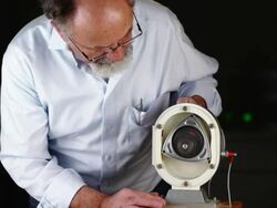 Scientist explaining a Wankel Engine Stock Footage
