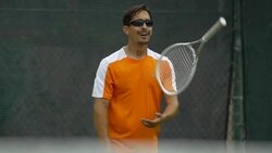 Tennis player practicing his return stance. - Slow Motion Stock Footage