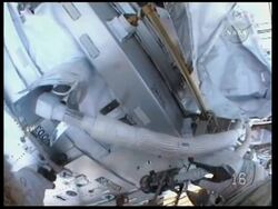 Latest pix of spacewalk, ground control status briefing News Clip