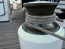 CU Rope being pulled with help of winch on clipper ship / Lipari, Sicily, Italy Stock Footage