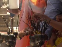 MS TU TD Man buying incense from vendor / Delhi, India Stock Footage