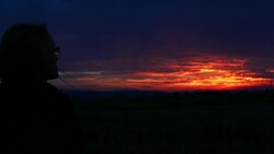 Woman Watching Sunset Stock Footage