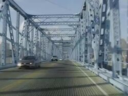 MS POV Shot of driving on John A. Roebling Suspension Bridge into Cincinnati / Cincinnati, Ohio, United States Stock Footage
