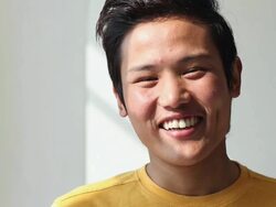 Portrait of a young man smiling Stock Footage