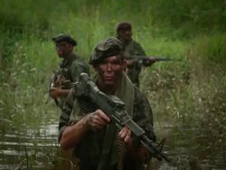 MS U.S. Special Operation Forces soldiers with automatic rifles walking in river in Vietnam war / Jungle, Hue, Vietnam Stock Footage