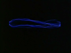 Sparks - CU many wavy lines of blue sparks between unseen points against black background Stock Footage