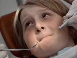 HD: Boy Closing His Mouth At The Dentist Stock Footage