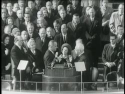 Chief Justice Earl Warren gives the oath of office to President Lyndon B. Johnson on January 20, 1965. News Clip