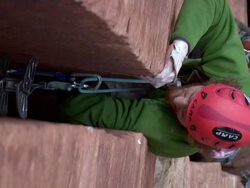 MS Climber struggles to gain few inches on very steep and wide crack  / Zion,UT,USA   Stock Footage
