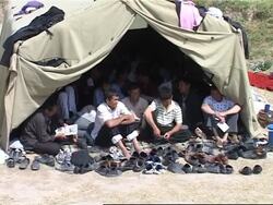 Uzbek refugees continued to stream across Kyrgz border fleeing recent violence News Clip