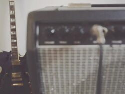 View on amplifier knobs, plugs and electric guitar Stock Footage