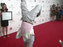 Evan Lamana 'walks' the red carpet at Moet & Chandon Toasts The 139th Kentucky Derby Stock Footage