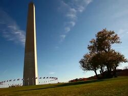 Wide pan of Washington Monument and its grounds in Washington DC Stock Footage
