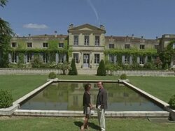 WS, CS, People talking in front of palace, Saint Ferme, Gironde, France Stock Footage