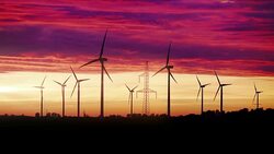 Video of windmills at the sunset in 4K Stock Footage