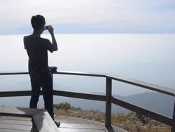Silhouette : young man take a panorama photo Stock Footage